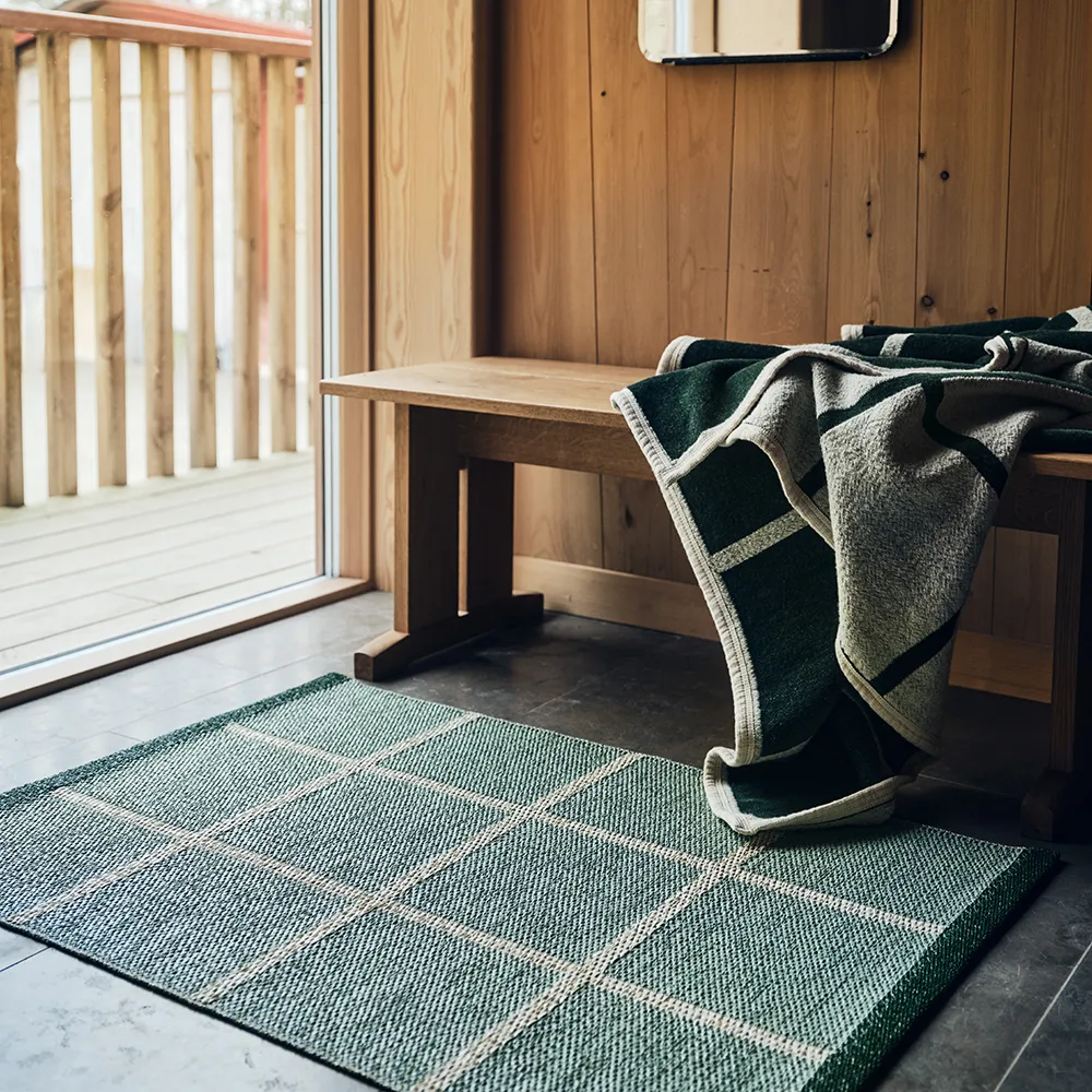 Vevd pledd i lammeull Criss Leaf