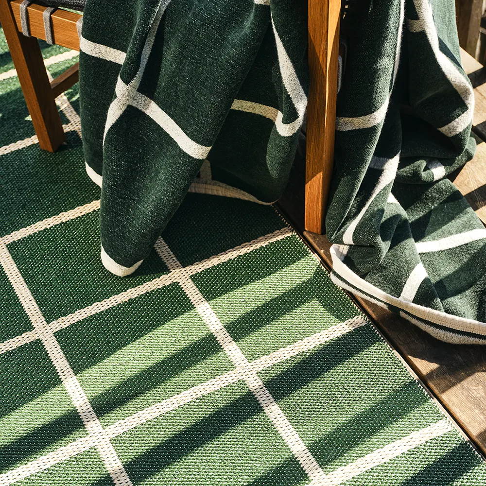 Vevd pledd i lammeull Criss Leaf