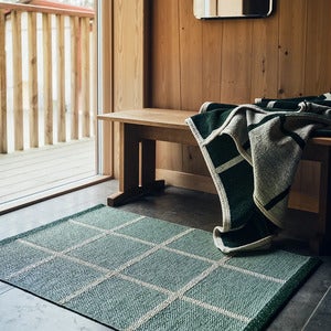 Vevd pledd i lammeull Criss Leaf